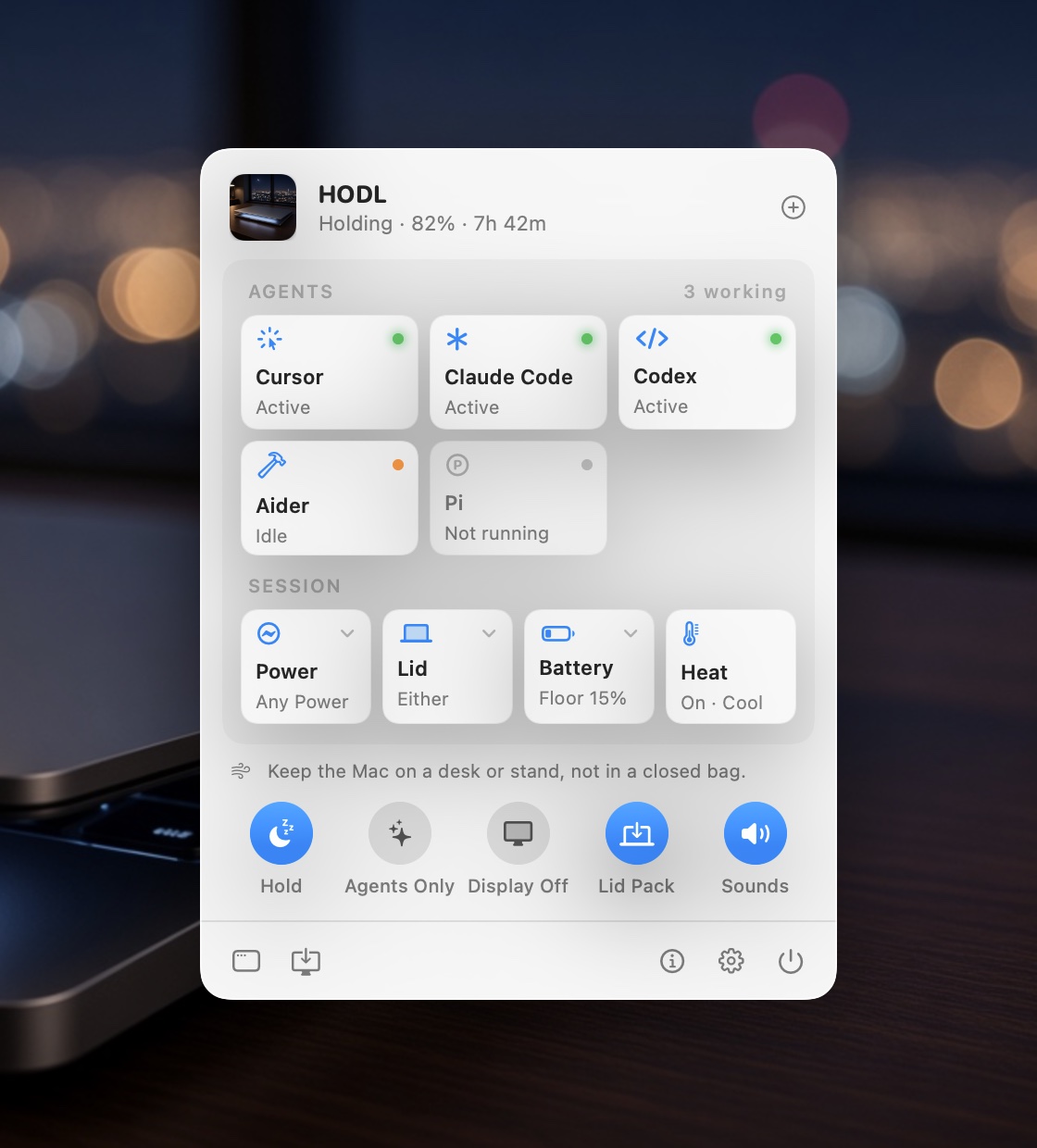 The HODL panel in light mode, over a blurred MacBook and city lights: “Holding · 82% · 7h 42m”, agent tiles for Cursor, Claude Code, and Codex marked Active, tiles for Power, Lid, Battery, and Heat, and round switches for Hold, Agents Only, Display Off, Lid Pack, and Sounds.