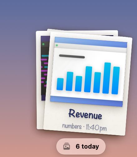 A neat pile of prints in the corner of the screen. The top print shows a bar chart captioned “Revenue”, with a “6 today” badge underneath.